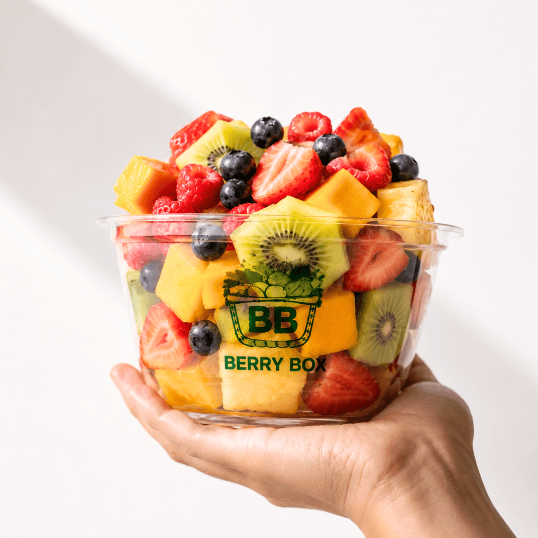 Bowl of colourful seasonal fruit.