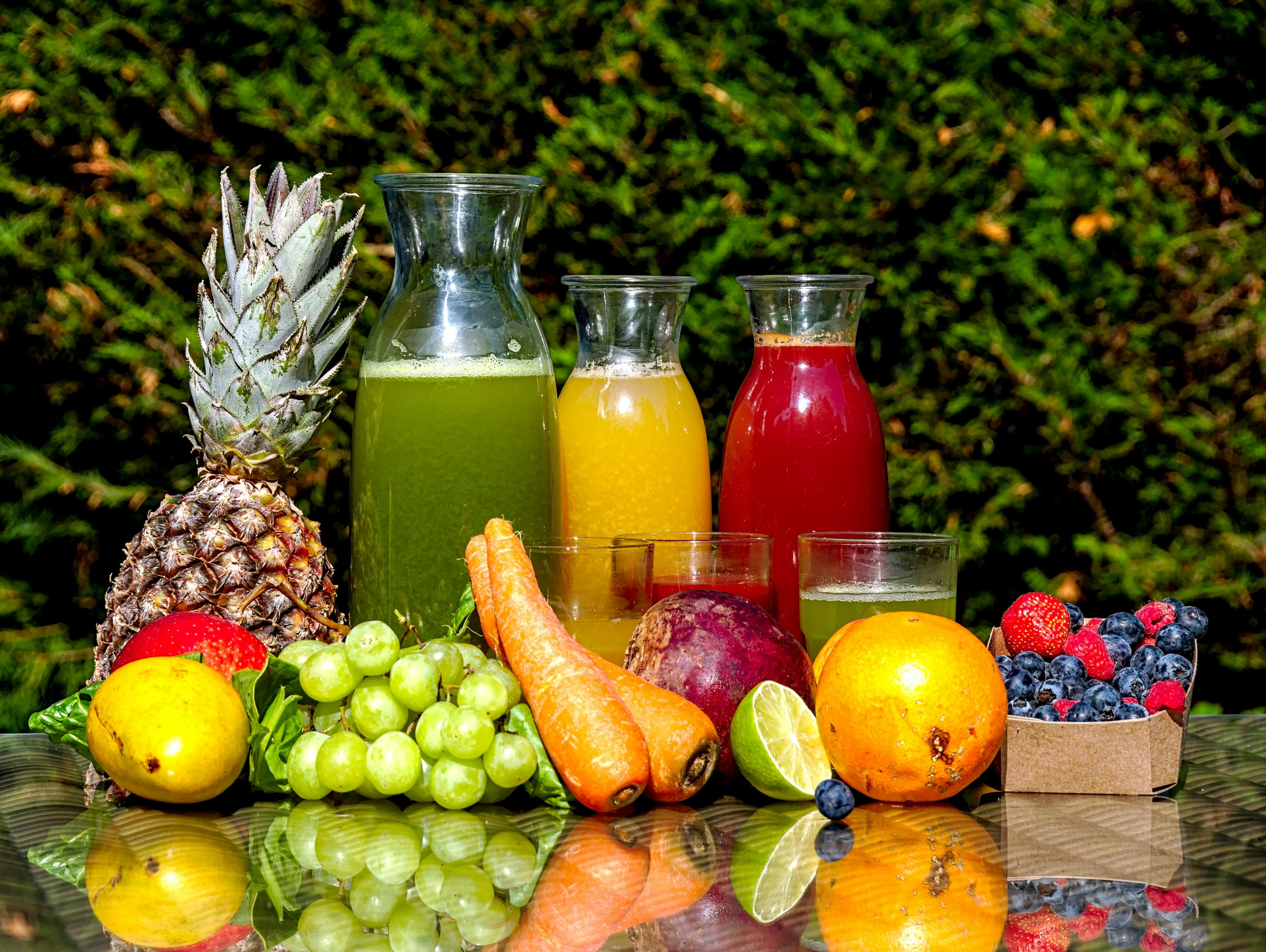 Employees picking fresh fruit from the office fridge